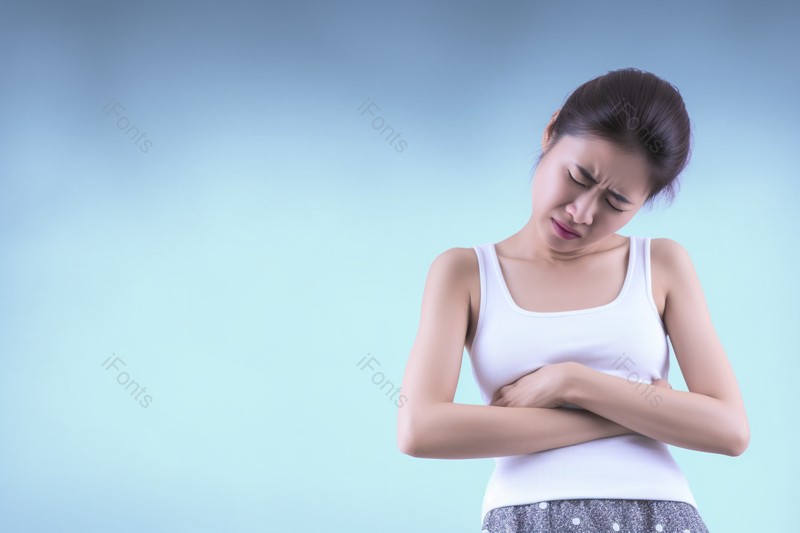 蓝色摄影图居家的女人表现胃痛,高清,摄影图,摄影图片,图片大全,摄影图免费下载